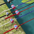 Colorful Fishing Rods With Red Blue Lines And Floats By Water With Lily Pads