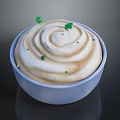 Creamy Sauce With Swirled Pattern And Green Herbs In Light Blue Bowl On Dark Background