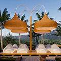 Scenic Camping Site with Conical Canopies White Bean Bags Palm Trees and Green Landscapes