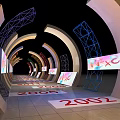 Activity Passageway With Arched Structure Screens Year Numbers And Geometric Frame Decorations