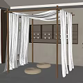 Wooden Four Poster Structure With White Sheer Curtains And Round Woven Cushions