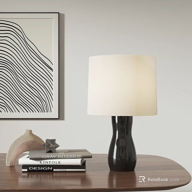 Black Ceramic Base White Fabric Shade Table Lamp On Wooden Table With Abstract Art 3d model 