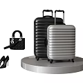 Stylish Black And Silver Suitcases With Handbag And High Heels On Display Platform