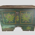 Vintage Wooden Storage Cabinet With Green Finish And Floral Painted Patterns