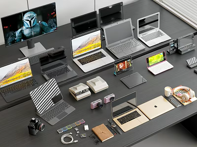 Various Laptops Monitors Tablets And Tech Accessories Displayed On Office Desk 3d model