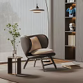Modern Accent Chair With Curved Back Beige Cushion Side Table Green Plant And Wooden Floor