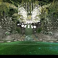 Luxurious Banquet Hall Setup With Hanging Greenery Chandeliers Round Tables And Soft Lighting