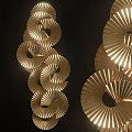 Modern Gold Spiral Wall Decor with Fan Shaped Patterns and Metallic Finish