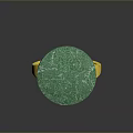 Elegant Green Round Stone Ring With Gold Band And Textured Surface