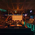 Cyberpunk Style Bar Interior With Neon Lights And Leather Seating