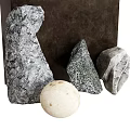 Natural Stones With Various Shapes And Light Sphere On Dark Wood Background