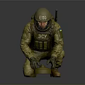 EOD Soldier In Military Uniform Kneeling To Defuse Explosive Device With Tactical Gear