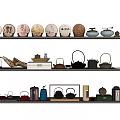 Assorted Tea Sets Displayed on Shelves with Ceramic Teapots Tea Caddies and Teacups 3d model