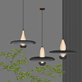 Three Modern Pendant Lights With Broad Brimmed Shades Golden Rods Gray White Tones And Green Plants