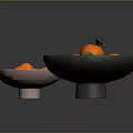 Fresh Tangerines in Two Bowls with Green Leaves on Dark Reflective Surface