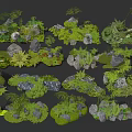 Small Garden Ornamental Pieces With Lush Green Plants Stones And Moss