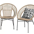 Rattan Outdoor Chairs With Black Metal Legs And Geometric Pattern Cushion