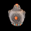 Traditional Decorative Household Container With Silver Body Intricate Patterns Orange Gemstone And Colorful Base Decorations