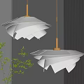White Layered Pendant Lights With Gold Base And Green Plants In Modern Interior