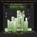 Stunning Art Installation With Green Transparent Columns Hanging Butterflies Flowers And Lush Greenery