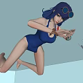 Woman In Blue Swimsuit Swimming Underwater With Goggles And Small Object