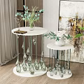 Elegant Modern Round Coffee Table With White Marble Top Glass Droplet Decor And Green Plants