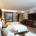 Cozy Hotel Room Interior With Twin Beds Wooden Wall Decor Desk Chair And Window Lighting