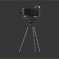 Vintage Electronic Camera With Blue Decorated Body On Metal Tripod Stand