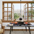 Fresh Fruits And Tea Set On Wooden Dining Table With Natural Window And Plants