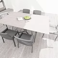 Modern Dining Table Set With Wooden Top Four Black Chairs Magazine And Fruit Bowl
