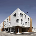 Modern Multi Storey Residential Building With White Exterior Wooden Elements And Street Lamps