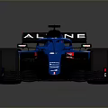 Blue Formula One Race Car with Aerodynamic Body Red Accents and Yellow Rimmed Wheels