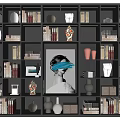 Modern Bookcase with Multiple Shelves Featuring Books Decorative Items and Portrait Under Warm Lighting