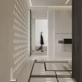 Modern Minimalist Interior Corridor With Light Shadow Patterns And Walking Figure 3d model