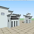 Traditional Chinese Symmetric Buildings Around Stone Paved Courtyard With Person Standing