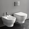 Modern Wall Mounted White Toilet With Bidet And Chrome Faucet In Bathroom