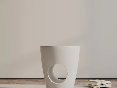 White Side Table With Circular Cutout Design Stacked Books Beside Light Colored Wall Wooden Floor 3d model