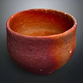 Handcrafted Ceramic Bowl With Reddish Brown Glaze And Textured Surface