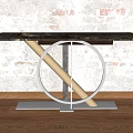 Modern Console Table With Circular Metal Frame And Smooth Top Against Textured Brick Wall