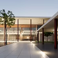 Modern White House Exterior Design With Large Windows And Green Lawn Against Blue Sky