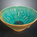 Hand Carved Ceramic Bowl With Turquoise Blue Glaze And Brown Base Artisanal Sculpted Design