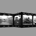 Black and White Photography Display Wall With Multiple Framed Panels In Exhibition Space