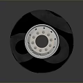 Black Car Tire With Silver Alloy Rim And Detailed Tread Pattern