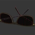 Stylish Black Rectangular Glasses With Red Accent Temple Arms Placed On Dark Reflective Surface