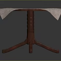 Patterned Light Colored Tablecloth On Round Wooden Leg Table For Home Use