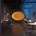 Beer Player Craft Beer Bar With Outdoor Seating Tables Chairs And Nighttime Lighting