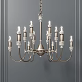Elegant Multi Arm Chandelier With Intricate Decorative Details Against Gray Wall