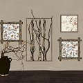 Elegant Wall Decor Featuring Decorative Frames With Floral Branch Patterns And Black Vase On Table 3d model