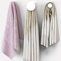Soft Decorative Towels Hanging And Rolled In Bowls Lavender Light Gray With Textured Edges