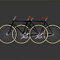 Vintage Black Bicycles With Red Seats Front Basket And Large Light Colored Tires